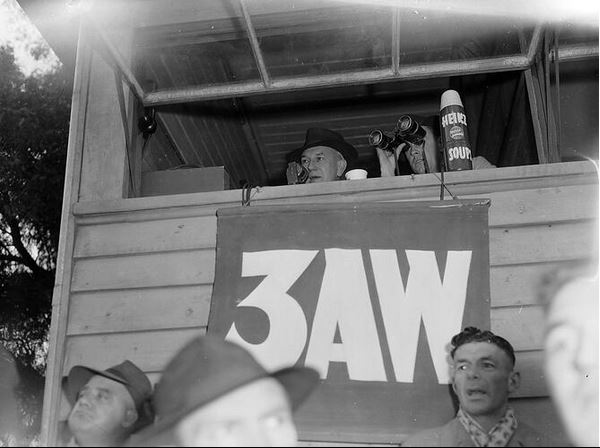 1953 Radio station 3AW broadcasters Norman Banks and former Australian Test cricket captain Ian Johnston calling the game at Carlton. 
Note: Heinz Soups thermos, radio game sponsor.
(Johnston was a RAAF Beaufighter pilot in WW2)