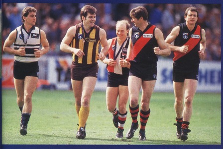 Smith (left) won the 1992 Morrish Medal as Best and Fairest in the TAC Cup Under-18 competition. Here he is during his lap of honour on Grand Final day.